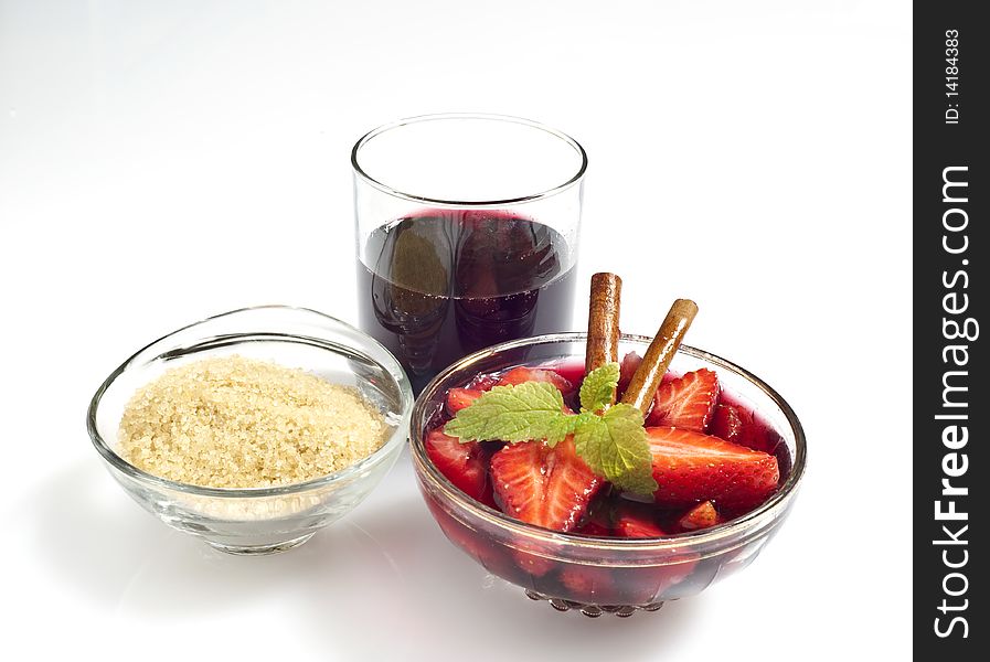 Ingredients to make strawberry wine on a white background. Ingredients to make strawberry wine on a white background