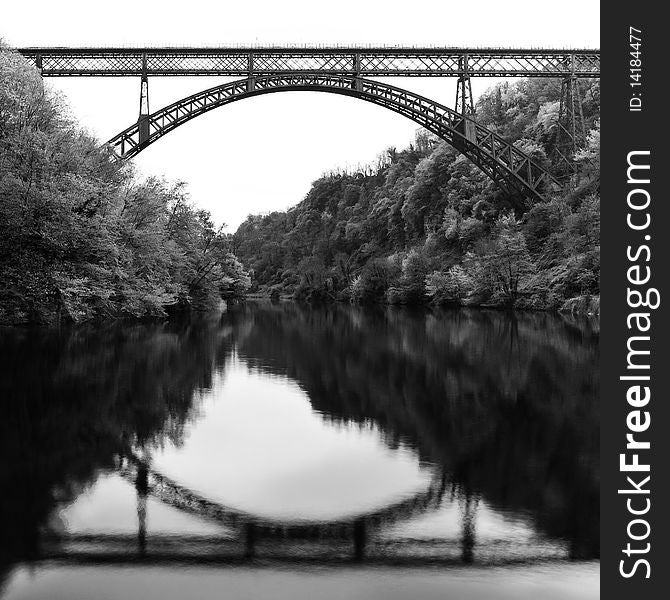 Iron bridge on Adda river. Lombardy, Italy.