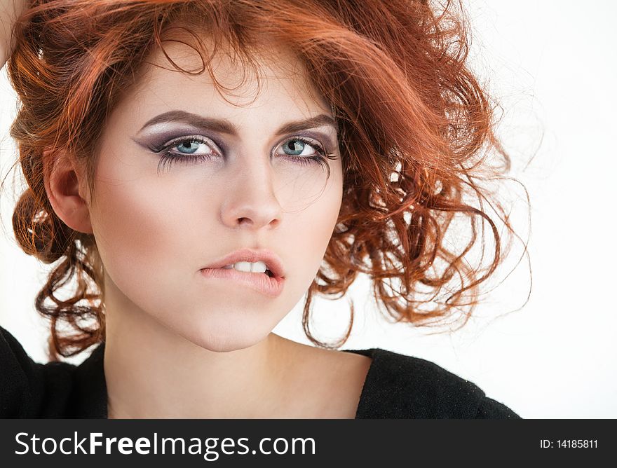 Young pretty girl portrait with red hair
