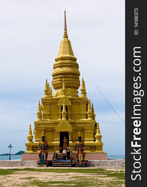 Golden Pagoda On Seashore