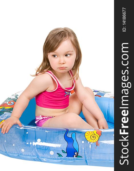 Little girl on the beach isolated