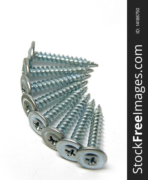 Eight steel screws with a carving