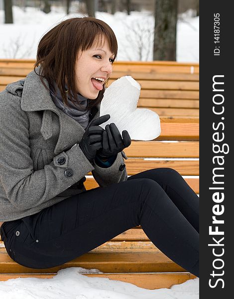 Girl holding an ice heart