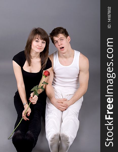 Funny couple posing in studio