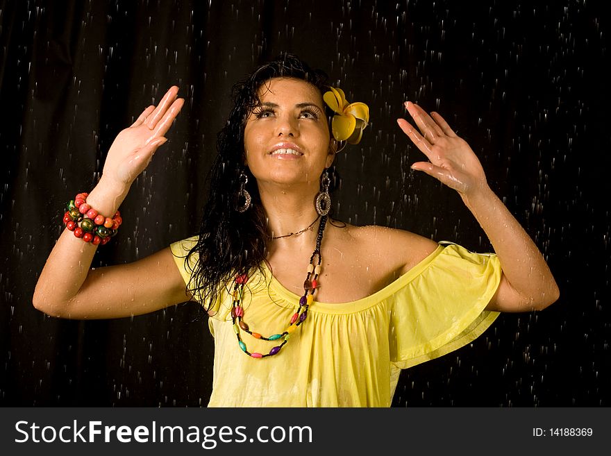 Closeup  portrait of a sexy woman in water studio