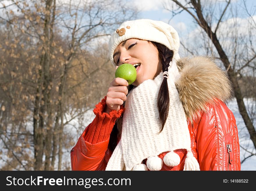 Funny girl eating apple