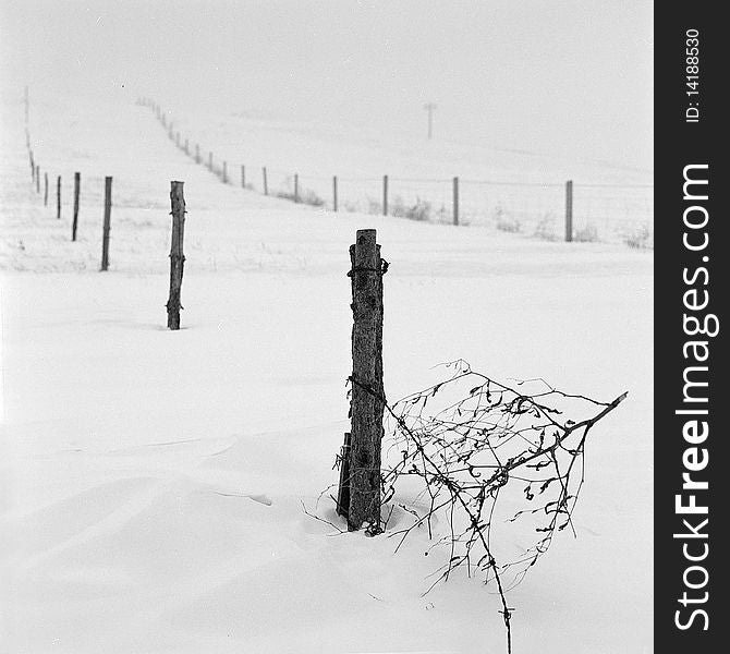 A broken fence in the snow,shooting in bashang of Hebei CHINA.