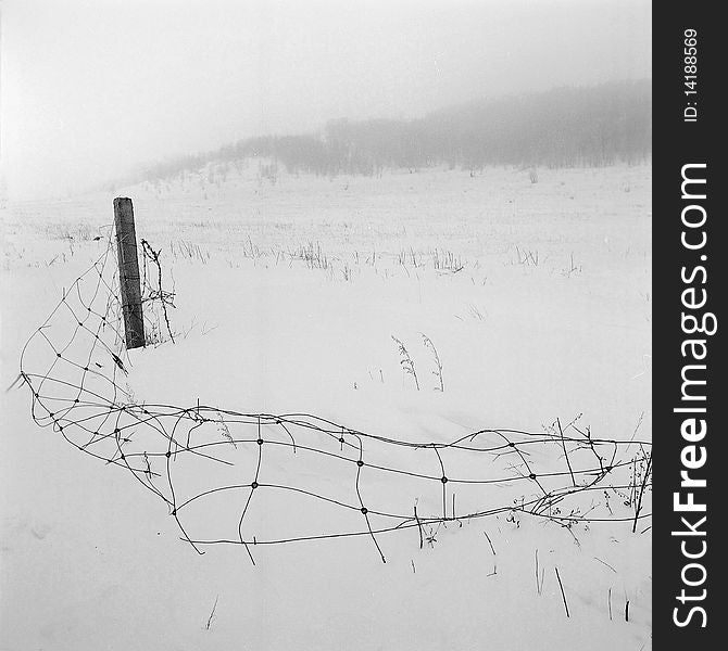 A broken fence in the snow,shooting in bashang of Hebei CHINA.