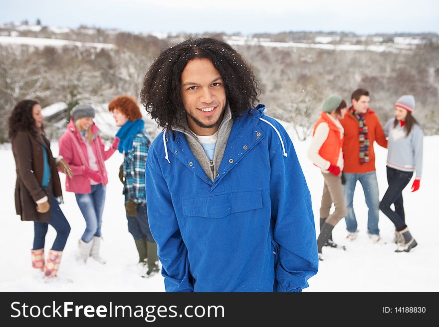 Young Friends Having Fun In Snow