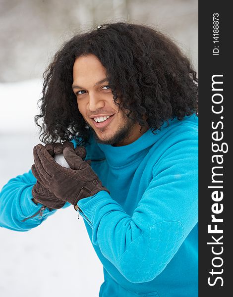 Young Man About To Throw Snowball