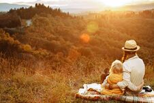 Mother And Child Hikers Looking Into The Distance While Sitting Stock Images