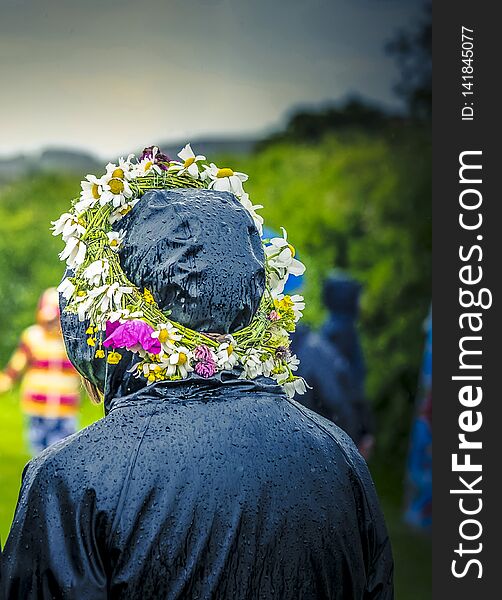 Rainy midsummer with flowers on the head. Rainy midsummer with flowers on the head.