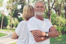 Happy Senior Couple Relax In The Park Royalty Free Stock Photos