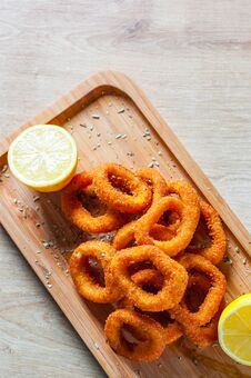 Fried Squid Rings Breaded With Lemon Royalty Free Stock Image