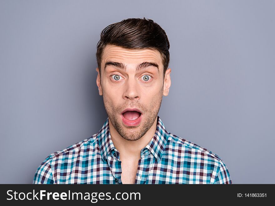 Close up photo amazing he him his man ideal perfect hairstyle styling mouth widely open eyes full fear oh no facial expression wearing casual plaid checkered outfit isolated grey background.