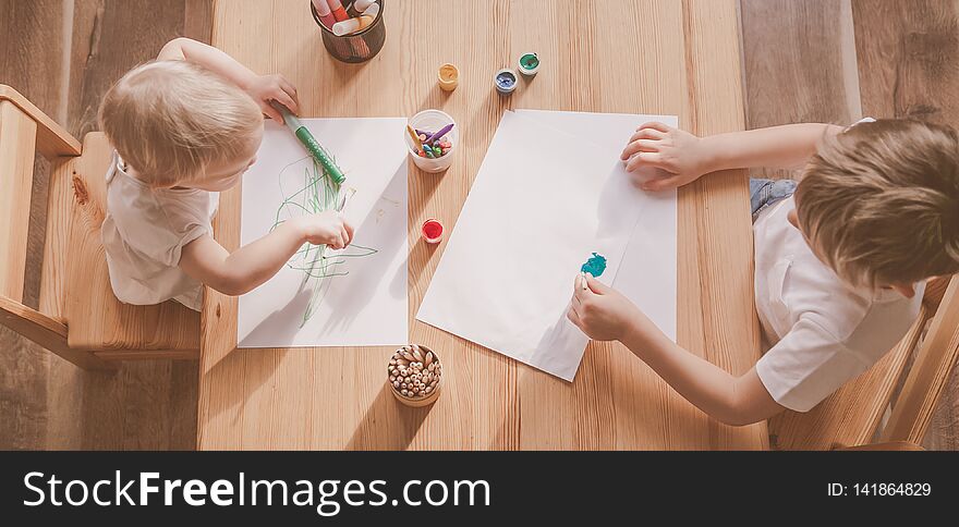 Kids painting with different materials