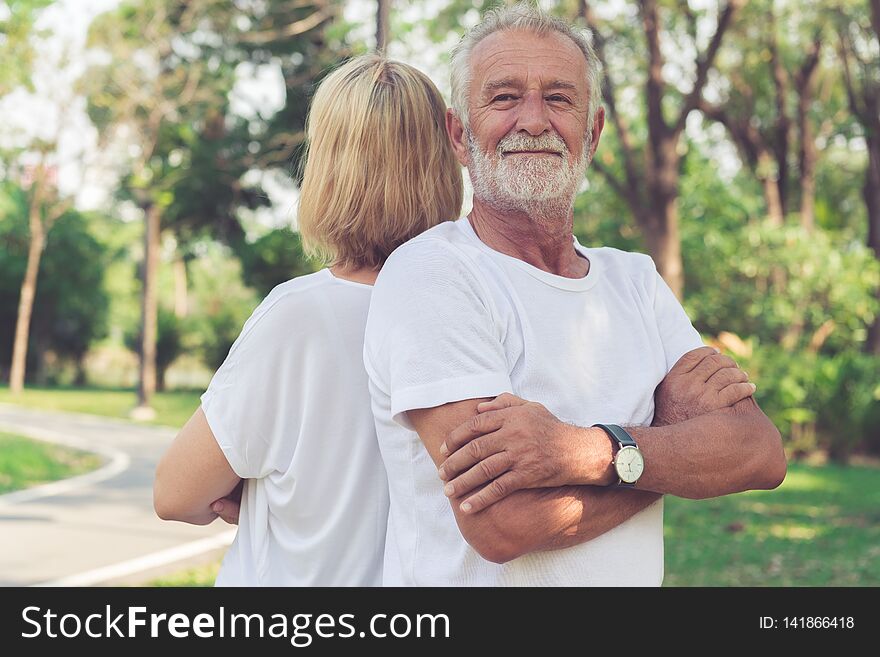 Happy senior couple relax in the park