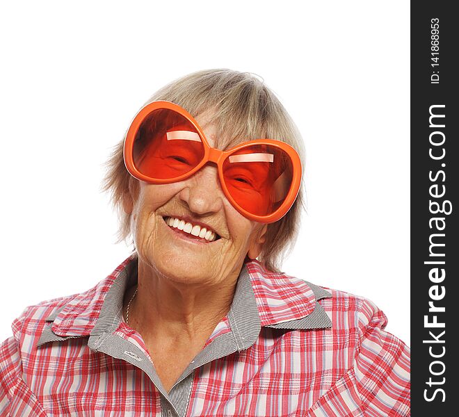 Senior happy woman wearing big sunglasses
