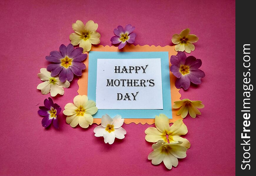 For Mother`s Day holiday the inscription on paper and color flowers