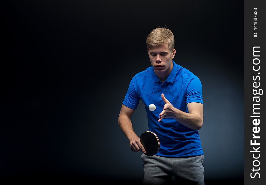 Portrait of young man playing tennis