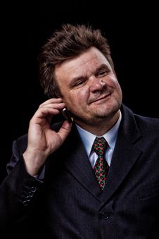 Businessman With Mobile Phone Speaking Royalty Free Stock Photography Businessman With Mobile Phone Speaking Royalty Free Stock Photography