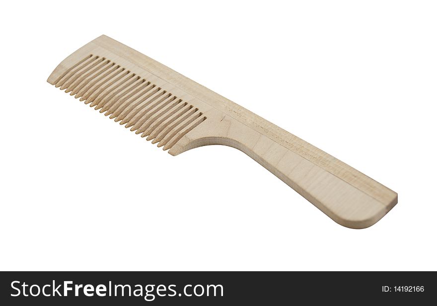 Wooden comb isolated on a white background