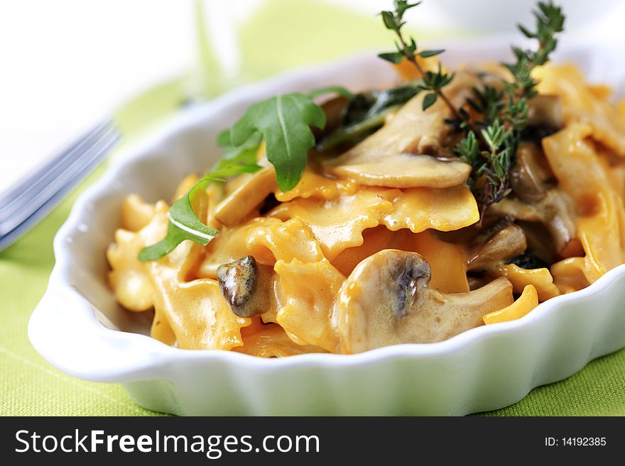 Farfalle with mushrooms and cream sauce - detail