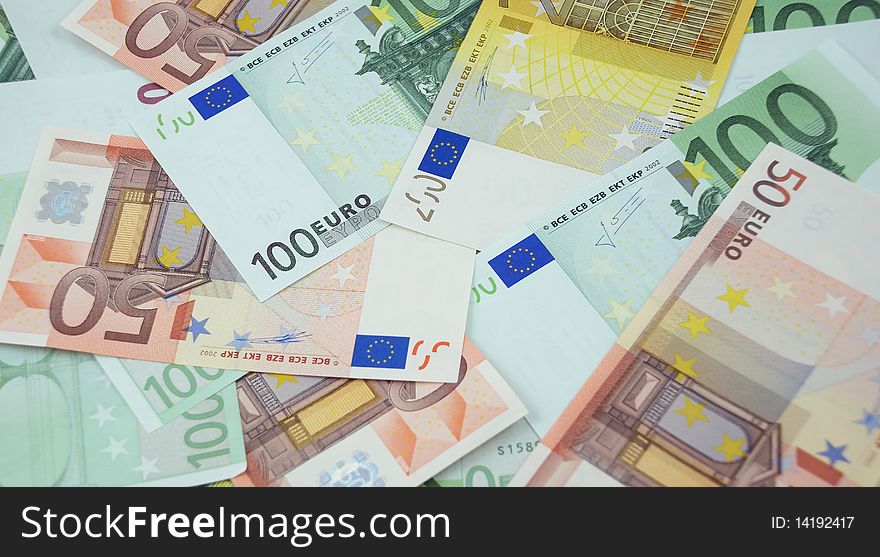 50, 100 and 200 euro banknotes background