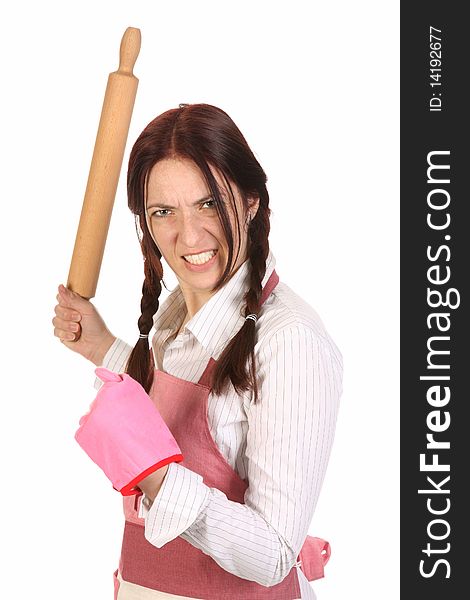 Mad housewife with a rolling pin on white background