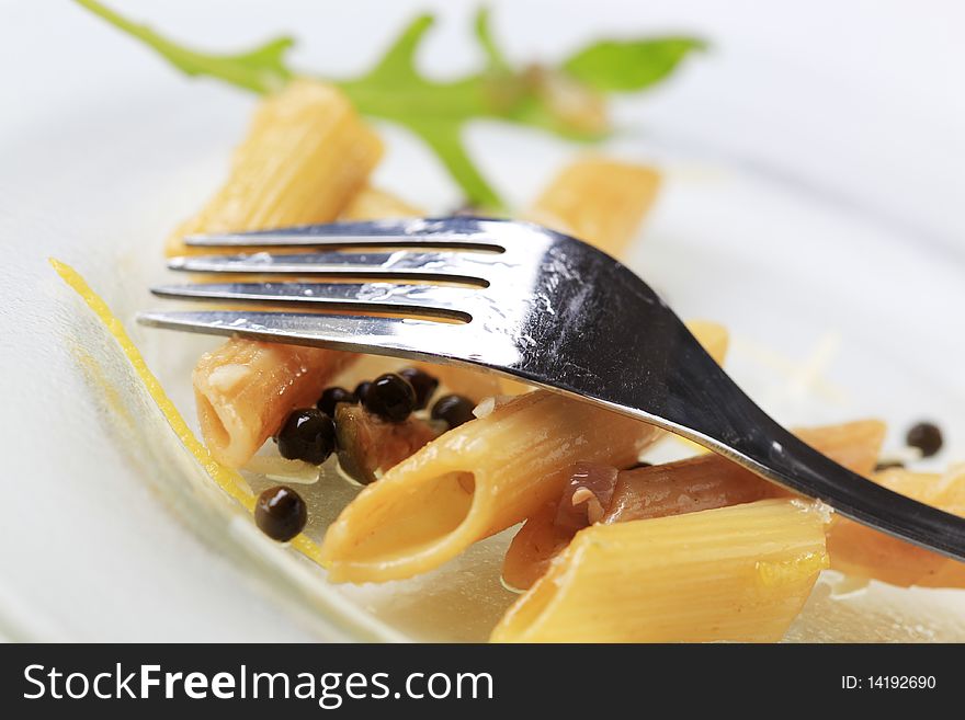 Penne with pickled peppercorns, capers and lemon zest. Penne with pickled peppercorns, capers and lemon zest