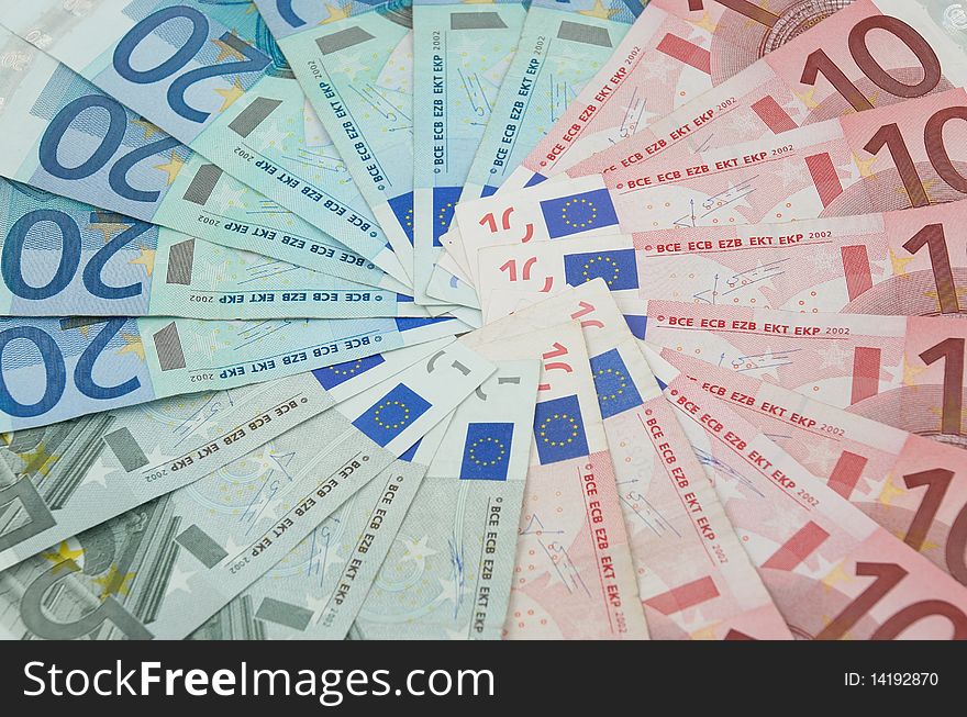 Five, ten and twenty euro banknotes background. Five, ten and twenty euro banknotes background