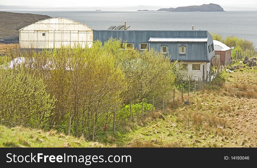 An image of a Hydroponicum situated on the West coast of Scotland overlooking the Summer Isles. This industry grows plants and crops in water with added nutrients rather than in soil. An image of a Hydroponicum situated on the West coast of Scotland overlooking the Summer Isles. This industry grows plants and crops in water with added nutrients rather than in soil.