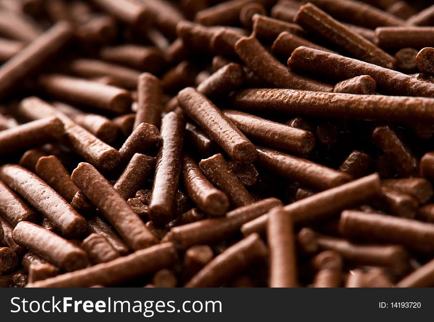 Chocolate sprinkles on white background. food ingredients