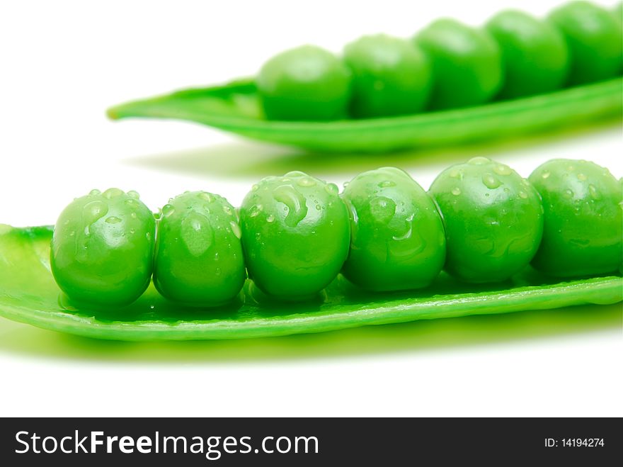 Fresh peas in pods on white background. Fresh peas in pods on white background