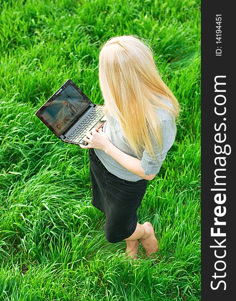 Beautiful Business Woman With The Laptop