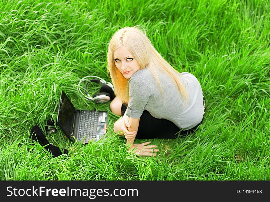 Beautiful business woman with the laptop