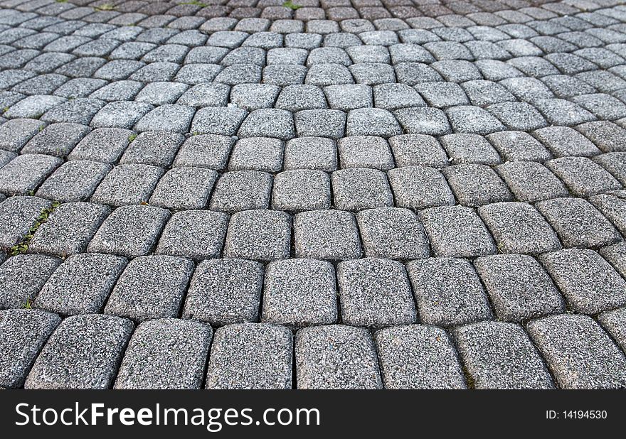 Stone paved road with nobody