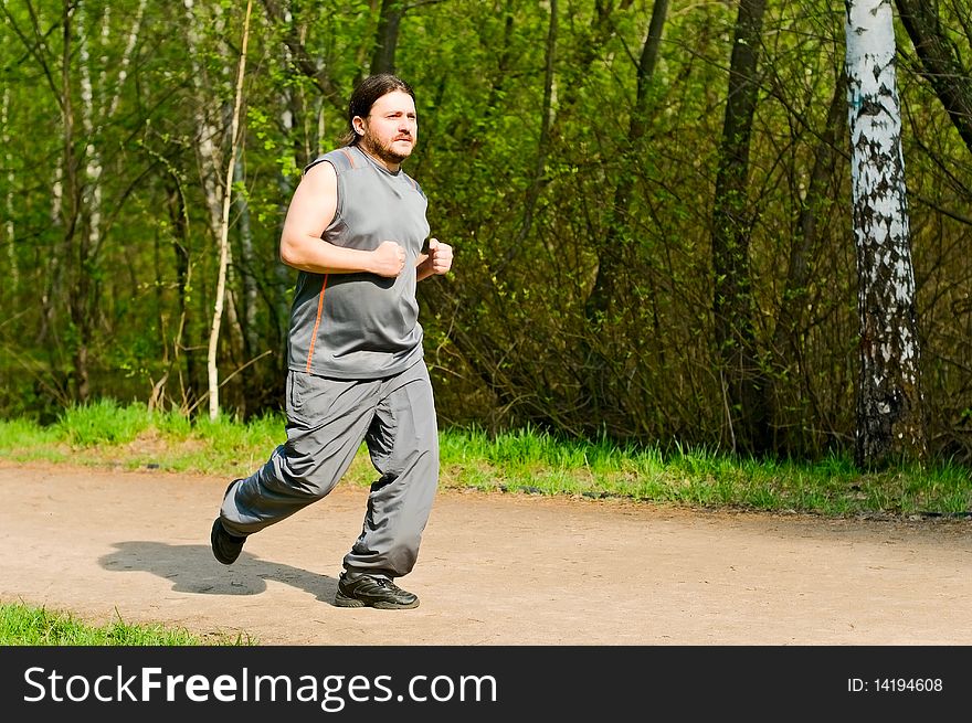 Man running in the park. Man running in the park