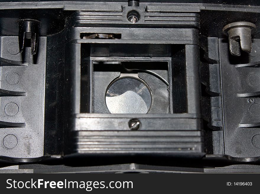 A glance inside an old classic photo camera. A glance inside an old classic photo camera