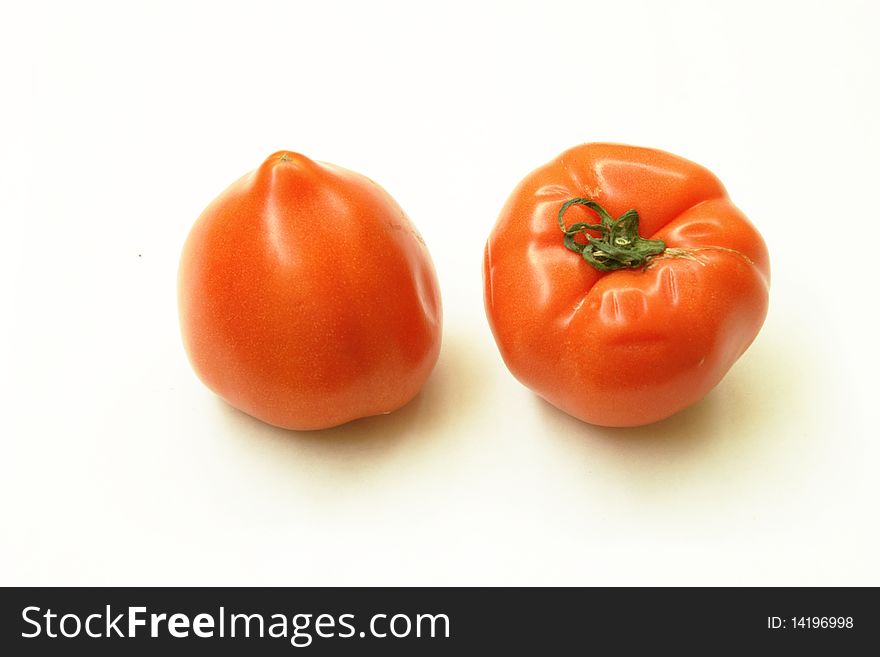 Fresh tomatoes, isolated in the white background
