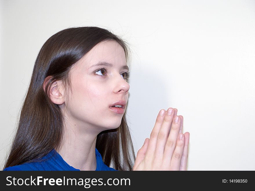 Young girl praying