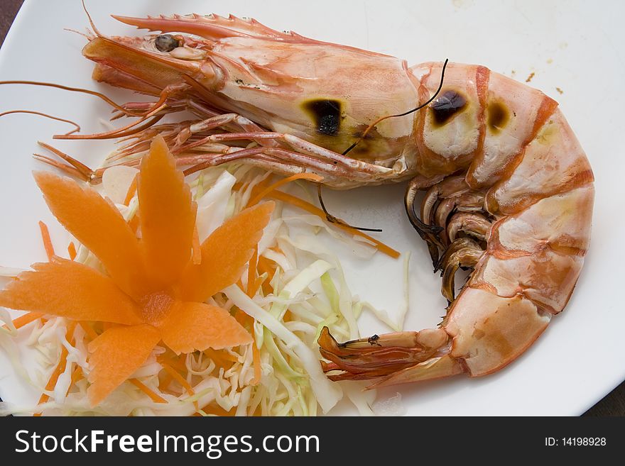 Boiled shrimp on a white plate. Boiled shrimp on a white plate