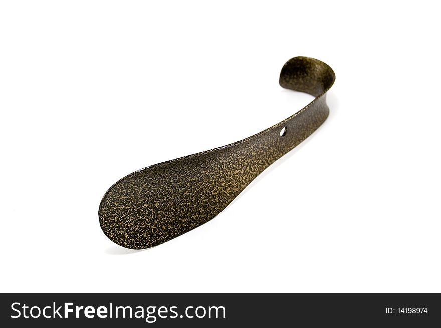 Photo of the shoehorn for footwear on white background
. Photo of the shoehorn for footwear on white background