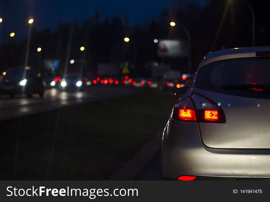 Traffic jam at night in a big city. Blurred Background bokeh