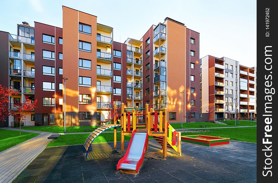 Apartment residential house facade architecture and kid playground