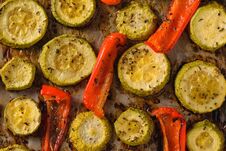 Baked Bell Peppers And Zucchini Close-up. Vegetarian Dish. Natural Plant Food. The View From The Top Stock Images
