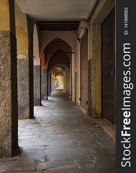 Alley Via dietro Duomo, with arcades. Padova, Italy