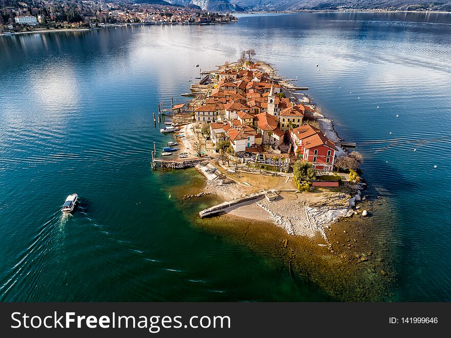 Aerial view of Fishermens Island or Isola dei Pescatori at Lake Maggiore, is one of the Borromean Islands in Piedmont of north Italy, Stresa, Verbania. Aerial view of Fishermens Island or Isola dei Pescatori at Lake Maggiore, is one of the Borromean Islands in Piedmont of north Italy, Stresa, Verbania