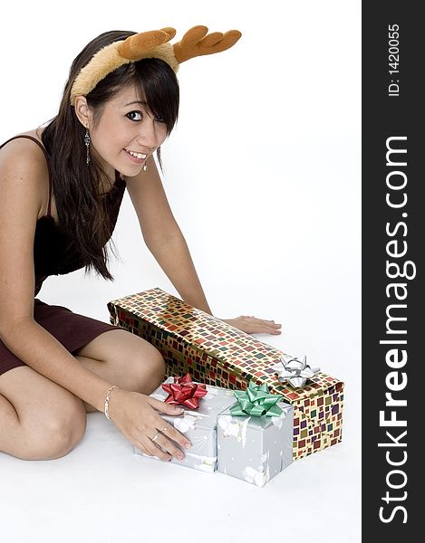 Cute Girl With Presents Looking At Camera. Cute Girl With Presents Looking At Camera