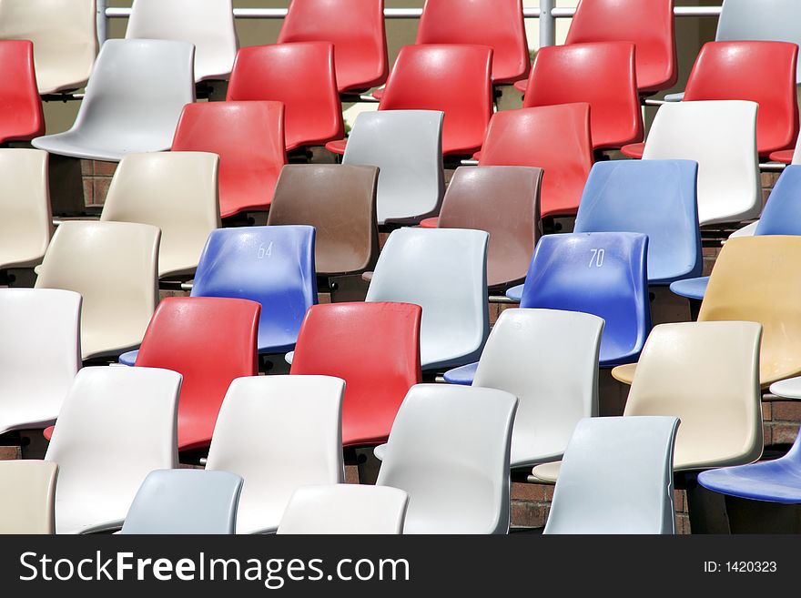 Colourful Empty Stadium Seats In Rows